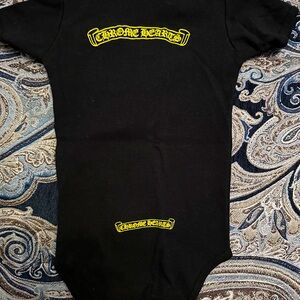 Black and yellow chrome heart onesie